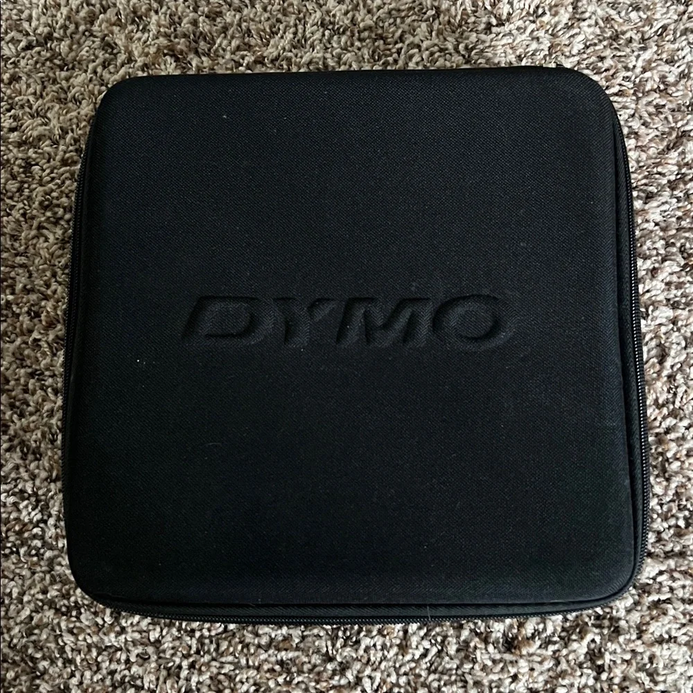 DYMO LabelManager 210D label maker with case and three label refills.